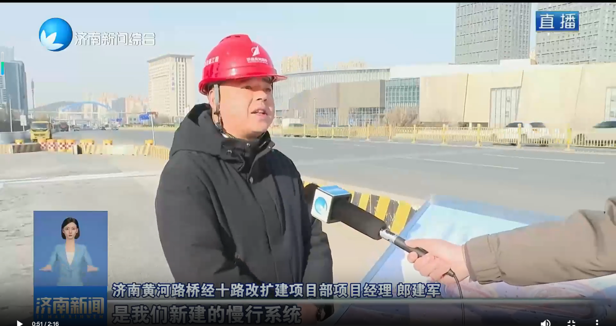 郎建军接受采访照片.png